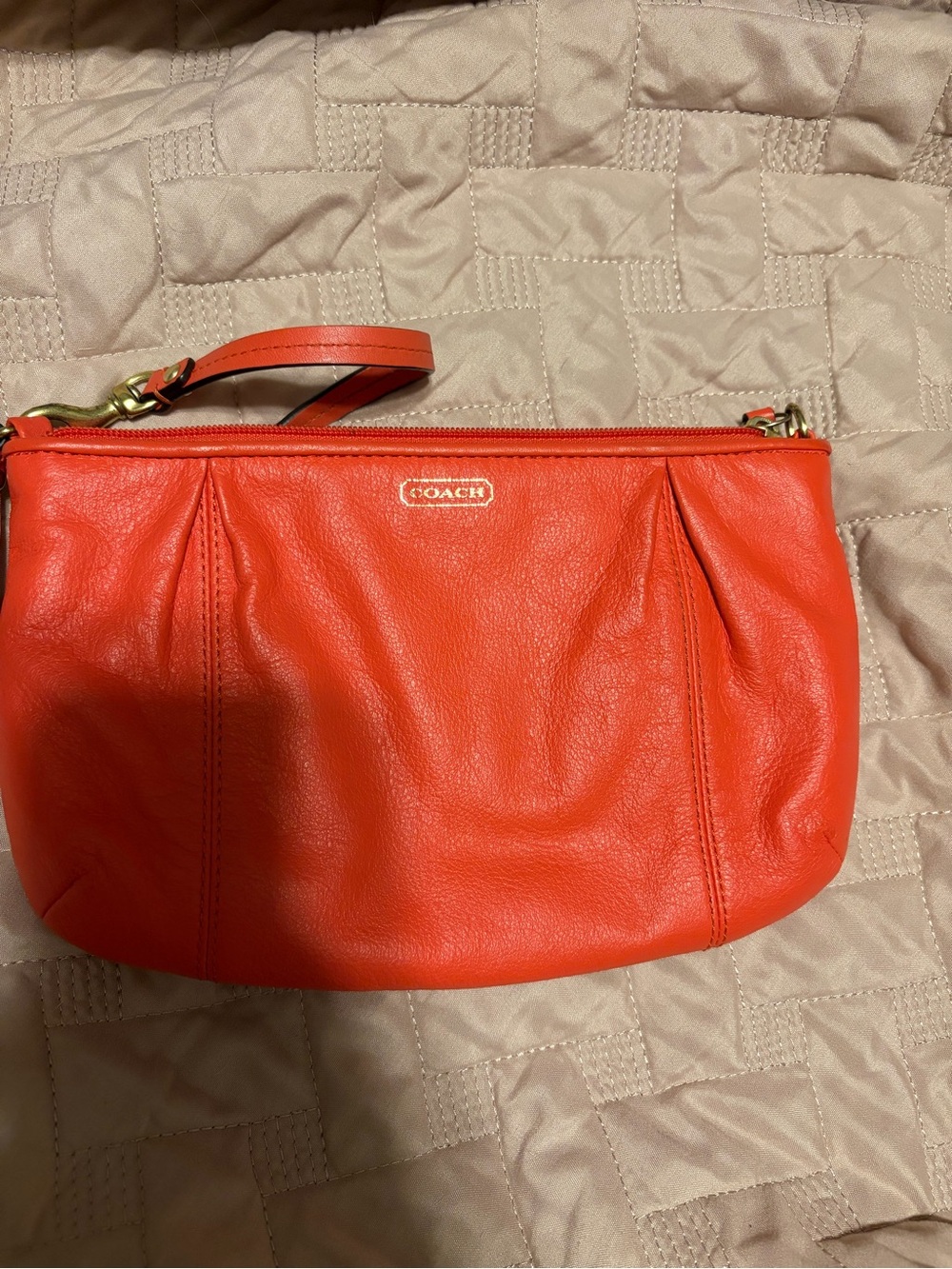 Coach Orange Leather Wristlet Clutch with Gold Hardware